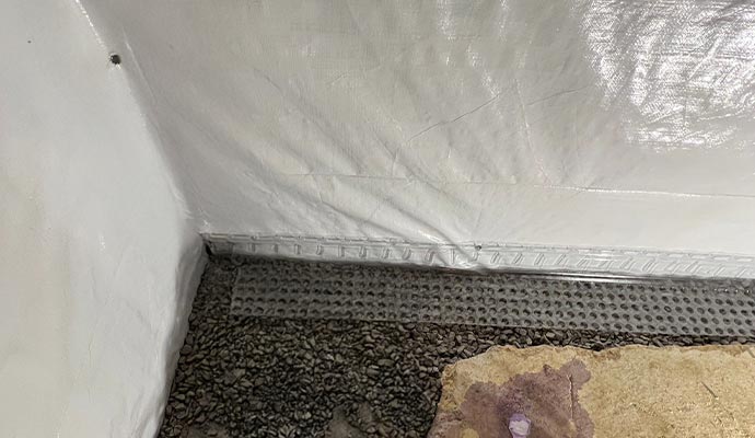 Baseboard drain system