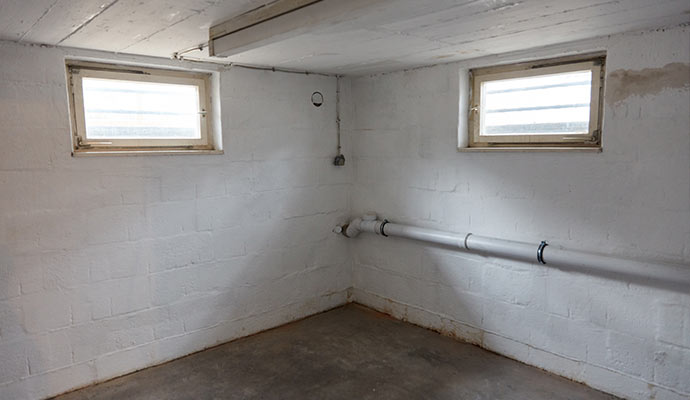 Basement interior with two small windows