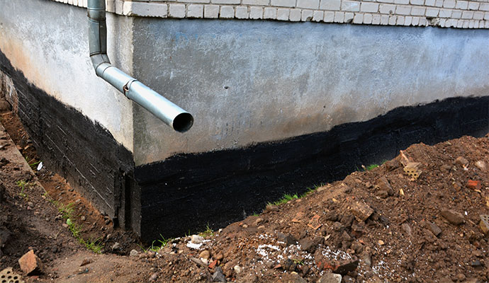 Foundation grading repair for rainwater management