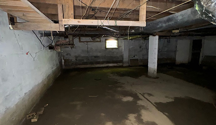 Musty odors from basement water accumulation