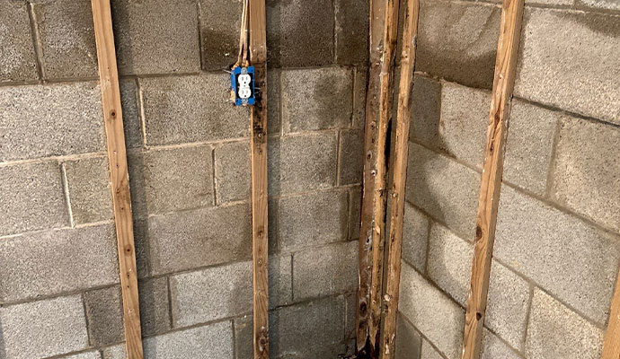 Moisture stains on basement foundation wall