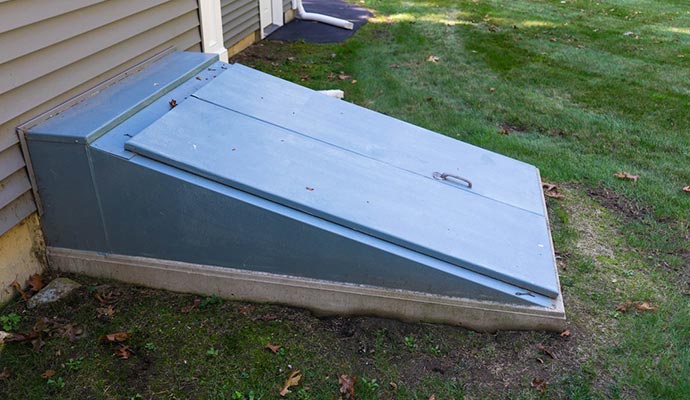 Blue color basement door installation