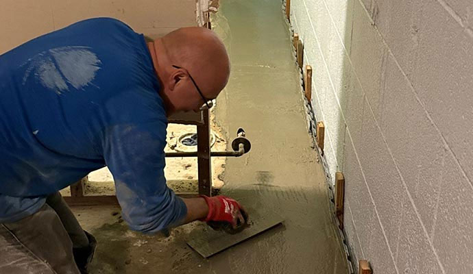 Concrete Floor Repair for Settlement and Moisture