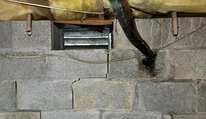 Foundation wall crack crawl space