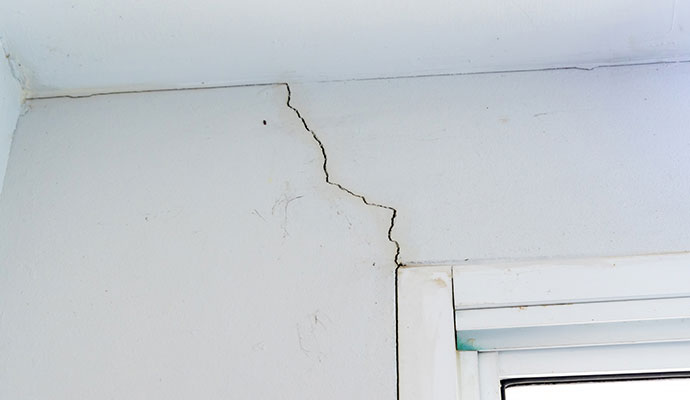 Foundation wall cracks near windows