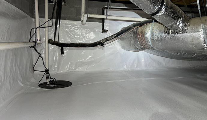 Sump pump installed in a crawl space