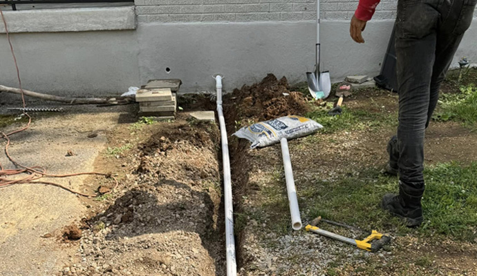 Installing an underground discharge line
